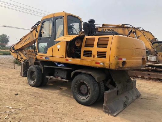 Excavadora de rodas Hyundai 210W em excelente estado com motor original