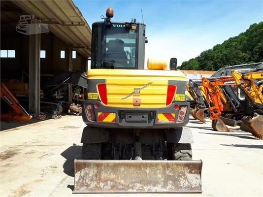Excavadora de rodas Volvo EW60 de segunda mão em boas condições e com outra capacidade de balde