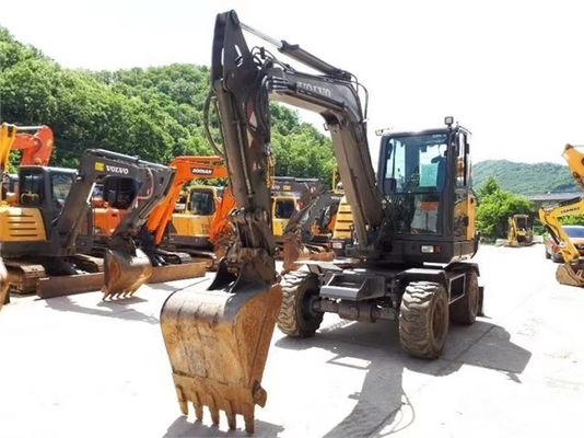 Excavadora de rodas Volvo EW60 de segunda mão em boas condições e com outra capacidade de balde
